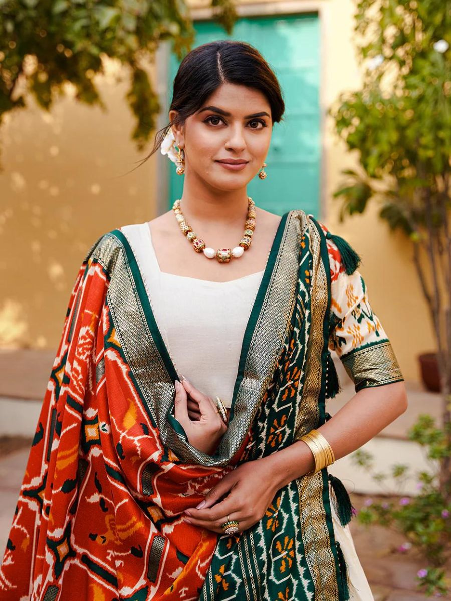 Orange Patola Printed Wedding Silk Gharchola Lehenga - Blouse Front Neck